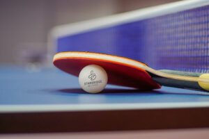 Close up of ping pong racket and a ball for table tennis at Starbridge Recovery